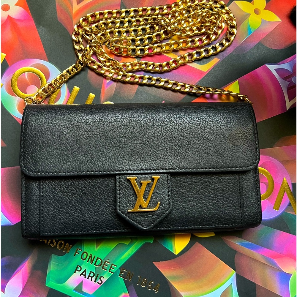 Louis Vuitton lock Me black calfskin leather continental long wallet